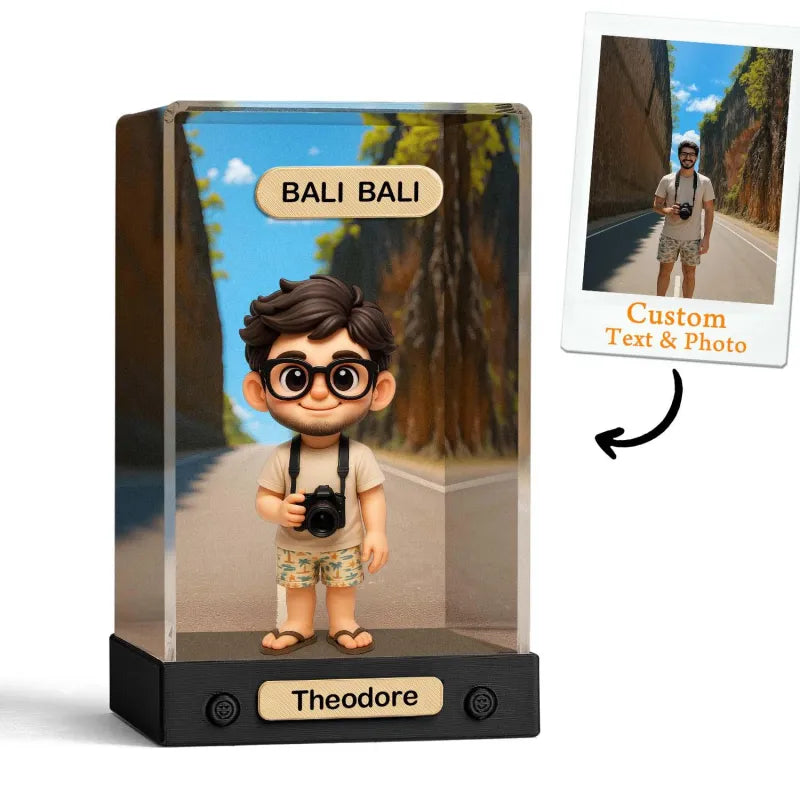 Customizable figurine with a customizable text and photo feature, displayed in packaging.