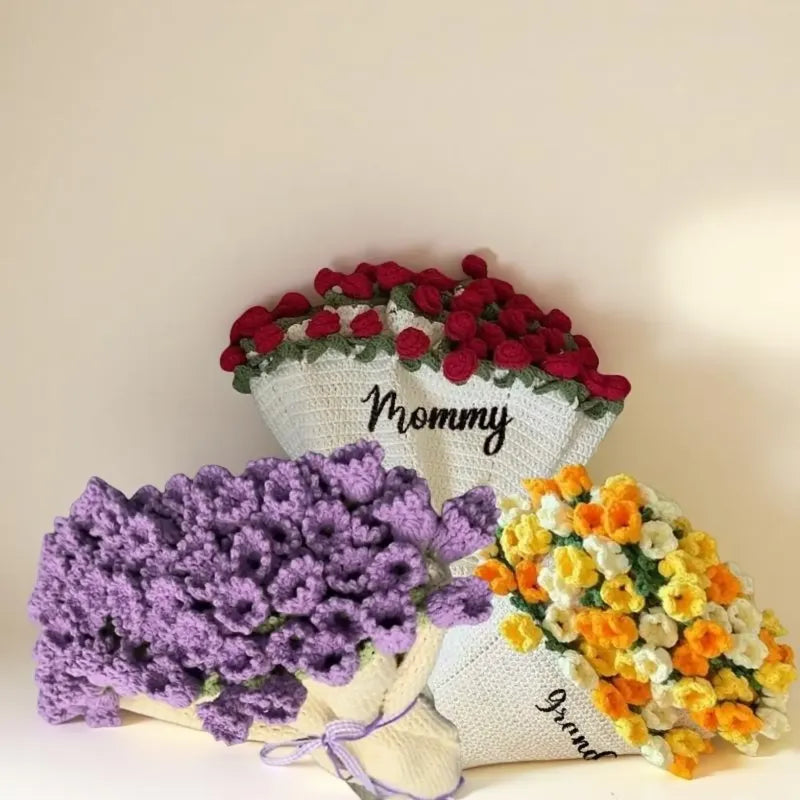 Three crocheted flower bouquets in red, purple, and orange on a light background.