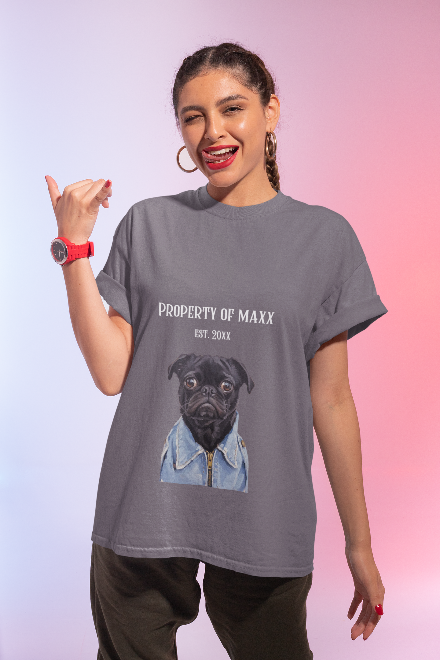 Woman wearing a gray t-shirt with a dog graphic and text, on a gradient background