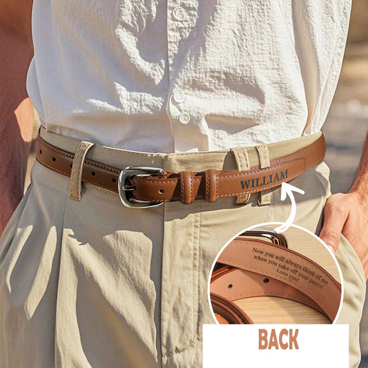 Brown belt with 'WILLIAM' engraved, worn by a person in a light shirt and beige pants.
