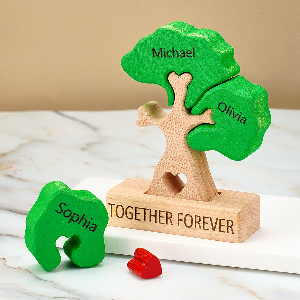Personalized wooden tree with names on green leaves and 'Together Forever' on a stand.