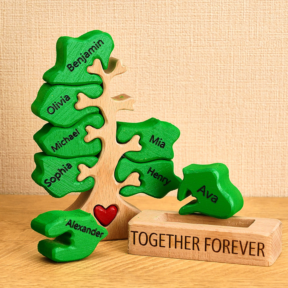 Wooden puzzle tree with green leaves and names, set against a beige background