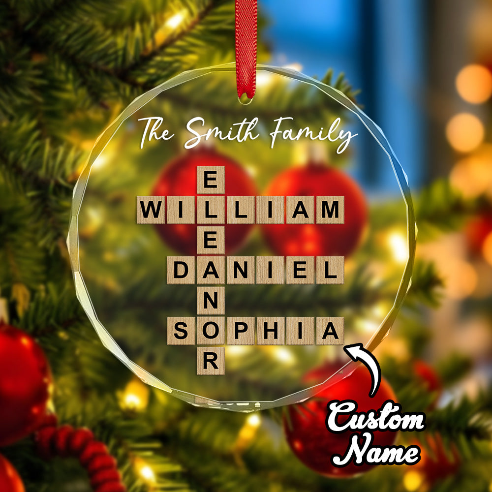 Clear acrylic ornament with personalized names on a Christmas tree background