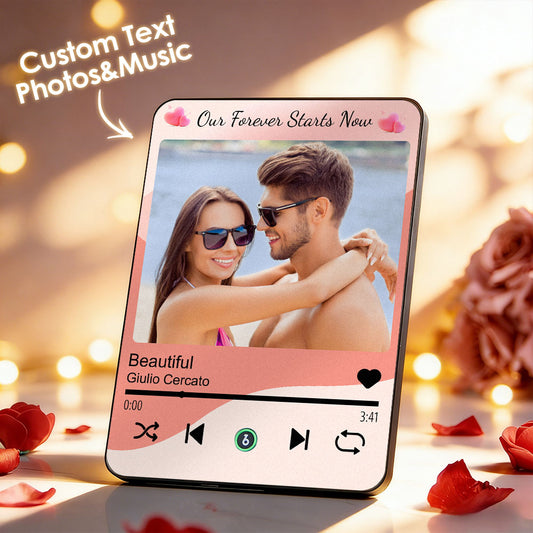 Phone screen displaying a romantic photo with music controls and text overlay on a blurred romantic background.