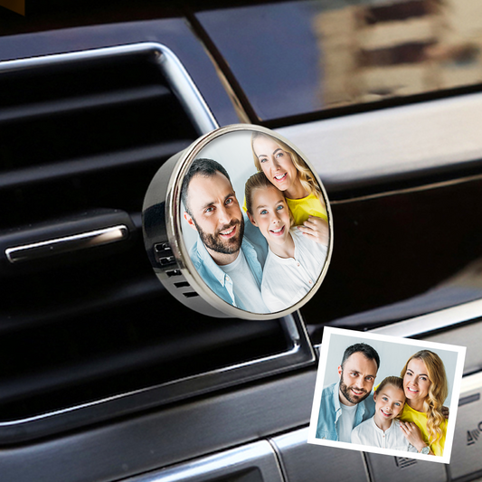 Car air freshener with a family photo on a car vent