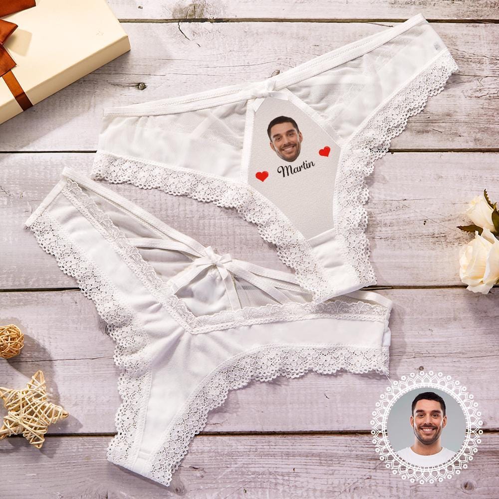 White lace lingerie set on a wooden surface with a photo of a man and text.