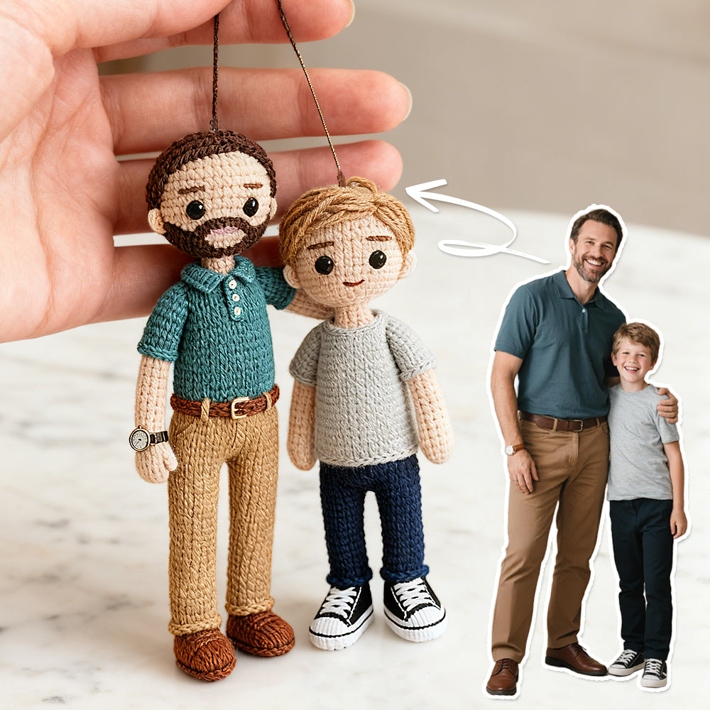 Handmade crochet dolls of a man and a child next to a real-life photo of a man and a child.