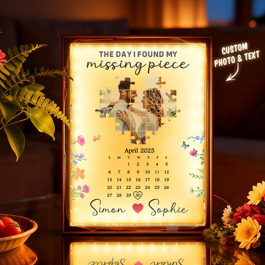 Personalized calendar with a couple's photo and text 'The Day I Found My Missing Piece' on a warm-toned background.