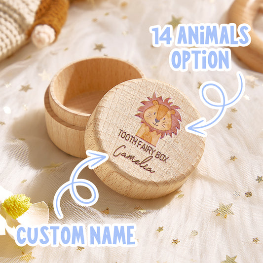 Wooden tooth fairy box with lion design and 'Camelia' text on a soft fabric background.