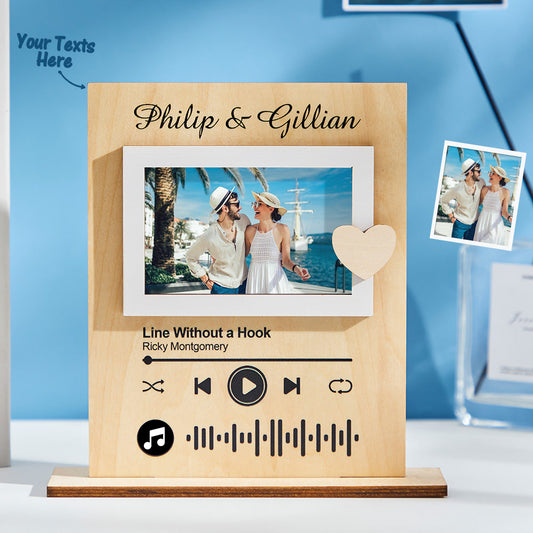 Wooden photo frame with music player design, personalized with names 'Philip & Gillian', and a couple's photo.