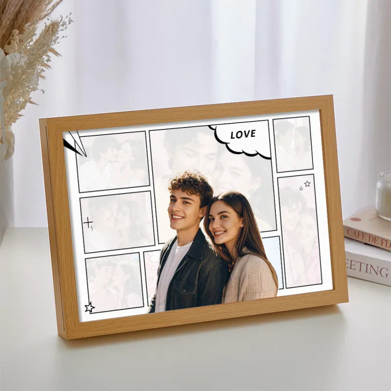 Wooden photo frame with a couple's photo and 'LOVE' text on a white surface.