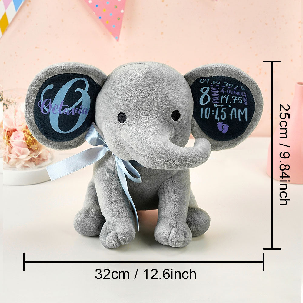 Gray elephant plush toy with personalized details and measurements on a light background